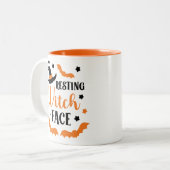 Resting heks Face Tweekleurige Koffiemok (Voorkant links)