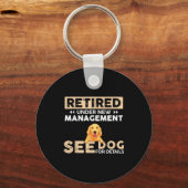 Retired Under New Management See Dog For Details  Sleutelhanger (Voorkant)