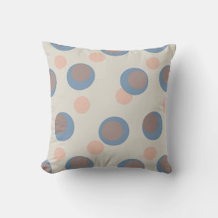 Retro blauw en roze stippen op wit kussen