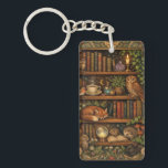 Retro book lover woodland animals sleutelhanger<br><div class="desc">A cozy retro-inspired design featuring a charming bookshelf filled with vintage books,  delicate botanical accents,  cute woodland animals and a comforting cup of tea or coffee.</div>
