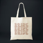 retro bride canvas tas bachelorette tas bride roze<br><div class="desc">Deze retro canvas tas kenmerkt een funky doopvont met een groovy lay-out. Geef alle kleuren uit om deze canvas tas volledig in uw gebeurtenis persoonlijke stijl te laten passen!</div>