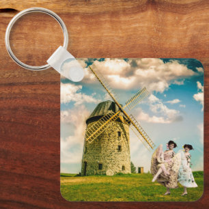 Retro dansende bloemenmeisjes en molen sleutelhanger