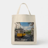 Retro gele tram op straat in Lissabon, Portugal Tote Bag (Achterkant)