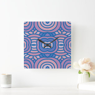 Retro geometrisch patroon in blauw en roze vierkante klok