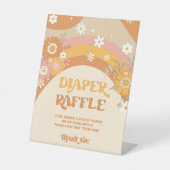 Retro groovy baby diaper raffle reclamebord met voetstuk (Voorkant)