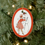 Retro Lady en Snowman Ceramic Ornament<br><div class="desc">Beide zijden van dit Holiday-ornament hebben een prachtig retro-afbeelding van een 50-jarige vrouw die gekleed is in een rode trui, gestreepte rok en roze pet. Ze is gestopt om het zwarte stropdas van de boeg recht te zetten op een glimlachende sneeuwman. De sneeuwman draagt een zwarte en rode bovenste hoed....</div>