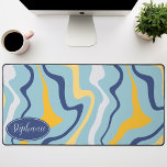 Retro Modern Abstract marmer werveling blauw en ge Bureaumat<br><div class="desc">Dompel jezelf onder in een dans van kleuren met ons Abstracte Retro Modern Liquid Marble Wave Pattern. Dit patroon roept de dynamische vloeibaarheid van gemarmerde oppervlakken en de charmante esthetiek van retro-modern design op en is een lust voor het oog. Een symfonie van levendige kleuren wervelt en stroomt in golfachtige...</div>