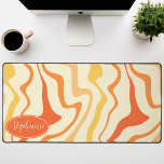Retro Modern Abstract Marmeren Swirl Sinaasappel G Bureaumat<br><div class="desc">Dompel jezelf onder in een dans van kleuren met ons Abstracte Retro Modern Liquid Marble Wave Pattern. Dit patroon roept de dynamische vloeibaarheid van gemarmerde oppervlakken en de charmante esthetiek van retro-modern design op en is een lust voor het oog. Een symfonie van levendige kleuren wervelt en stroomt in golfachtige...</div>