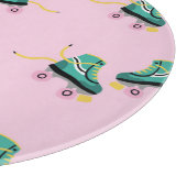 Retro roller schaatsen: roze. snijplank (Hoek)