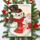 Retro  Snowman in Tophat Custom Kerstmis Feestdagen Kaart<br><div class="desc">Pas deze schattige klassieke kerstkaart aan met een sneeuwpop met een rode sjaal en een zwarte bovenste hoed terwijl je een krong mistletoe aan de ene kant vasthoudt met een snoepriet aan de andere kant. Pas de tekst aan door jouw naam toe te voegen of gebruik het ontwerpbewerkgereedschap om de...</div>