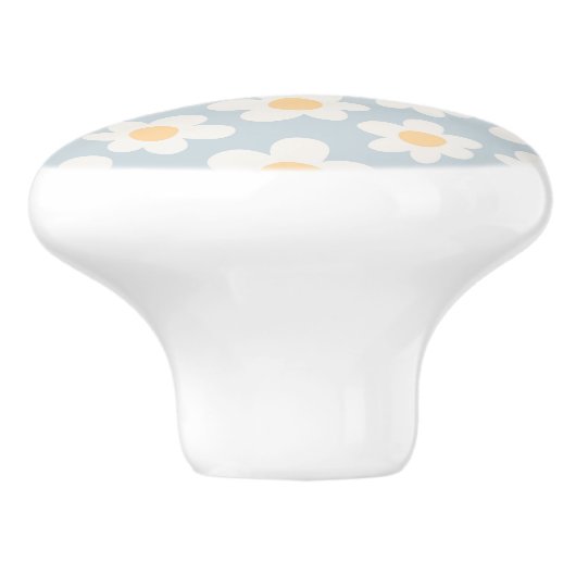 Retro stijl madeliefjes in bloei op blauwe achterg keramische knop (Zijkant)