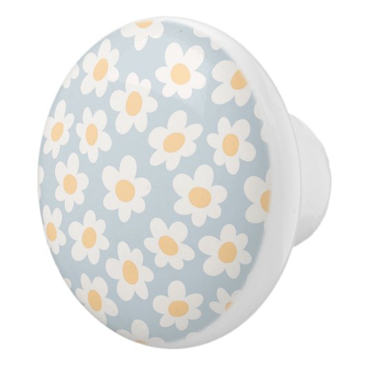 Retro stijl madeliefjes in bloei op blauwe achterg keramische knop (Rechts)