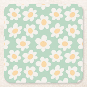 Retro stijl madeliefjes in bloei op groene achterg kartonnen onderzetters