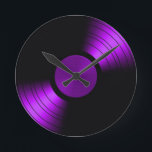 Retro Vinyl Record Album in Paars Ronde Klok<br><div class="desc">Dit is een geweldig retro vinylalbum ontwerp om de liefde van de vinylrecords te vieren. Het ziet er zo mooi uit op de zwarte achtergrond. Ik heb alle overeenkomende producten, evenals andere kleuren, in mijn winkel. Al mijn producten kunnen ook worden aangepast</div>