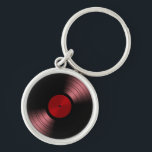 Retro Vinyl Record Album in rood Sleutelhanger<br><div class="desc">Dit is een geweldig retro vinylalbum ontwerp om de liefde van de vinylrecords te vieren. Het ziet er zo mooi uit op de zwarte achtergrond. Ik heb alle overeenkomende producten,  evenals andere kleuren,  in mijn winkel.
Al mijn producten kunnen ook worden aangepast.</div>