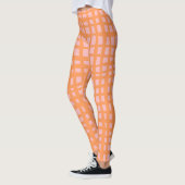 Retropastel oranje en roze rasterpatroon leggings (Links)