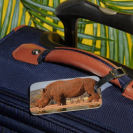 Rhino met modder op de huid foto bagagelabel