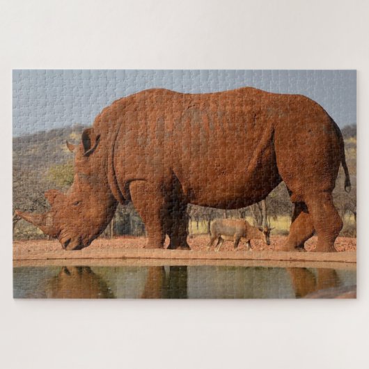 Rhino met modder op de huid legpuzzel (Horizontaal)