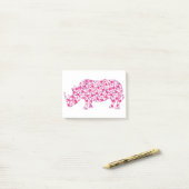 Rhinoceros gemaakt in roze harten post-it® notes (Op bureau)