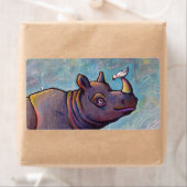 Rhinoceros maakt kleine vogelroddel leuk schilderi etiket (Insitu)