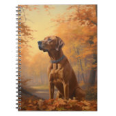 Rhodesian Ridgeback in herfstbladeren val inspirer Notitieboek (Voorkant)