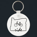 Ride Oregon (fietsen) Sleutelhanger<br><div class="desc">Oregon heeft het allemaal voor fietsers,  van touring of mountainbiking tot de fietsvriendelijke stad in Amerika (Portland). Show je liefde voor fietsen in Oregon!</div>