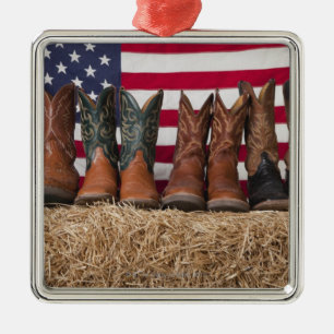 Rij cowboylaarzen op hooiberg metalen ornament