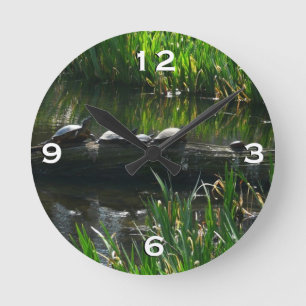 Rij schildpadden groene natuur foto ronde klok