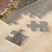 Rij van oude kleurrijke houten huizen legpuzzel (Zijkant)