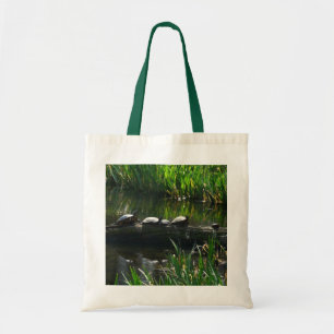 Rij van schildpadden groene natuur foto tote bag