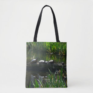 Rij van schildpadden groene natuur foto tote bag