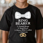 Ring Bearer Taken Grappige Bruiloft T-shirt<br><div class="desc">Maak je kleine ringdrager klaar voor de grote dag met dit grappige en schattige t-shirt met zijn belangrijke taken! Dit speelse t-shirt is ideaal voor jongens die enthousiast zijn om hun rol te spelen in de huwelijksceremonie. Het ontwerp bevat een checklist van ringdragertaken, waardoor het een leuke en memorabele aandenken...</div>