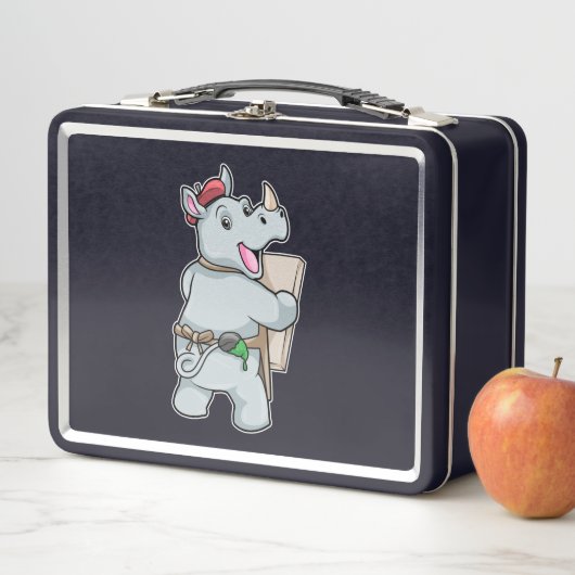 Rino bij het schilderen met kleuren (In situ)