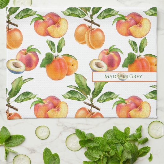 Ripe perziken, abrikozen en pompelmoezen theedoek (Gevouwen)