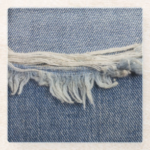 Ripped jeans textuur, stijlvolle achtergrond. glazen onderzetter