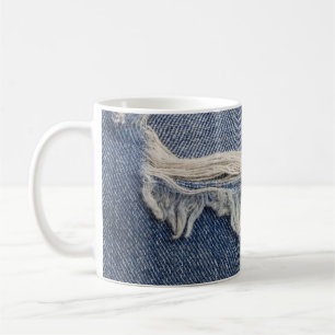 Ripped jeans textuur, stijlvolle achtergrond. koffiemok