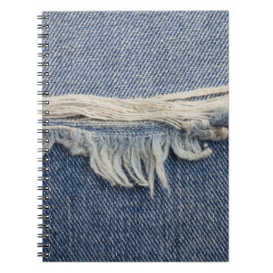 Ripped jeans textuur, stijlvolle achtergrond. notitieboek