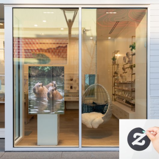 River Serenity: Capybaras Zwemmen in de Flow Raamsticker (Winkelraam)