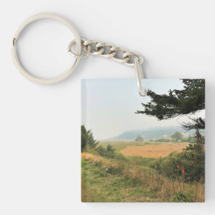 Riviervloed aan de Kaap Blanco, oregon kust Sleutelhanger