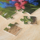 road leading to the village with mountains in the legpuzzel (Zijkant)