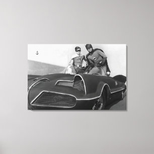Robin en Batman staan in Batmobile Canvas Afdruk