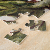 Robin moeder vogel voedt broed in het nest legpuzzel (Zijkant)