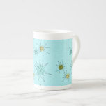 Robin's Egg Blue Atomic Starbursts China Mok<br><div class="desc">Deze Robin's Egg Blue Iconic Atomic Starbursts Bone China Mok patroon kenmerkt iconische atomaire sterrenbursts. Dat klopt! De oude school, robin's eitblauwe achtergrond met gouden spugen, is de perfecte achtergrond voor de levendige turquoise, het kalkselderij en kitschy peren groene cirkels. De vlekken van kleur worden sporadisch geplaatst in diverse grootte...</div>
