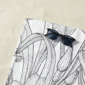 Robins en leliebloemen, zwart en wit strandlaken (In situ)