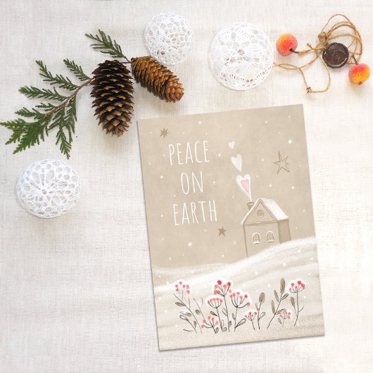 Robuust kersthuis in sneeuw feestdagenkaart