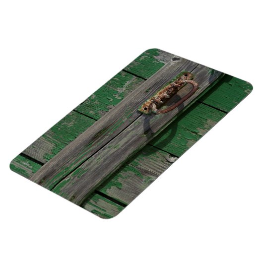 Robuuste deurhandgreep op groene deur magneet (Linkerzijde)