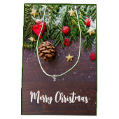 Robuuste kersttafel met pine en sneeuw medium cadeauzakje (Achterkant)