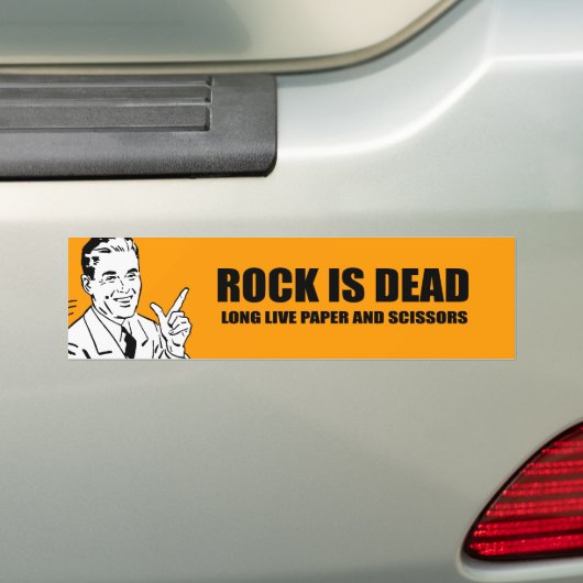 ROCK IS DOOD. LONG LEVENDE PAPIER EN SCISSORS. BUMPERSTICKER (Op auto)