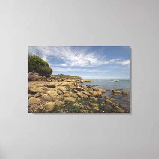 Rocky Seaside met motorboot Canvas Afdruk (Voorkant)