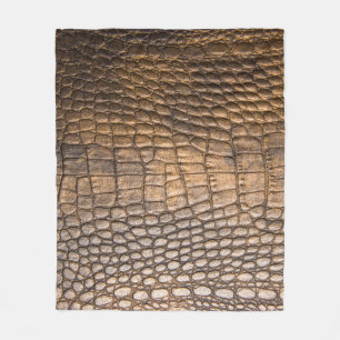 ?Rocodilleder. Achtergrond bruin leder en de bruin Fleece Deken